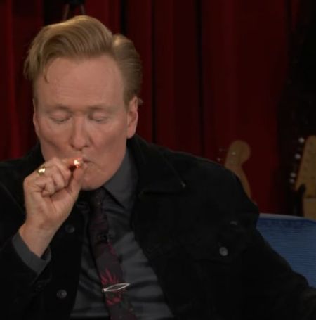 Canon O'Brien smoking joint in his show.